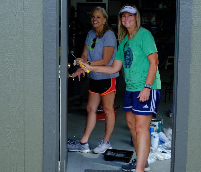 Painting at the Freedom for Youth Volunteer Day 2022 for the Foster Group Team