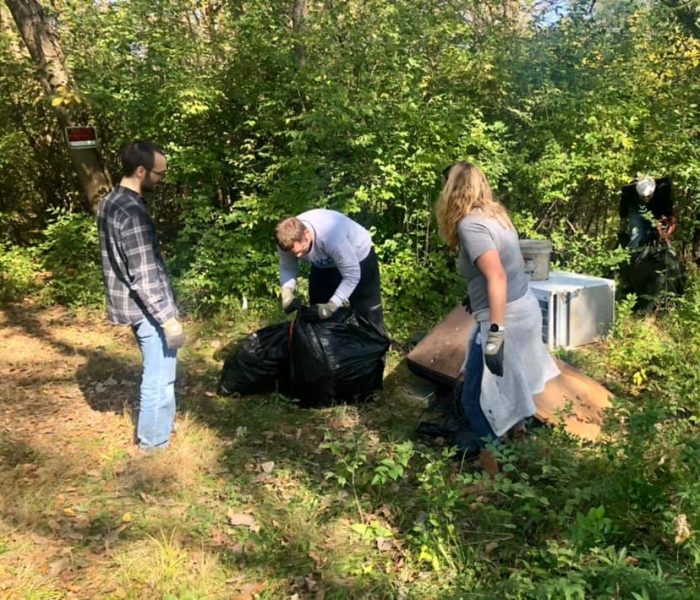 Campus clean up at the Freedom for Youth Volunteer Day for the Foster Group Team