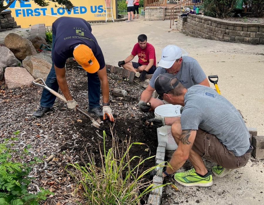 Landscaping at the Freedom for Youth Volunteer Day for the Foster Group Team